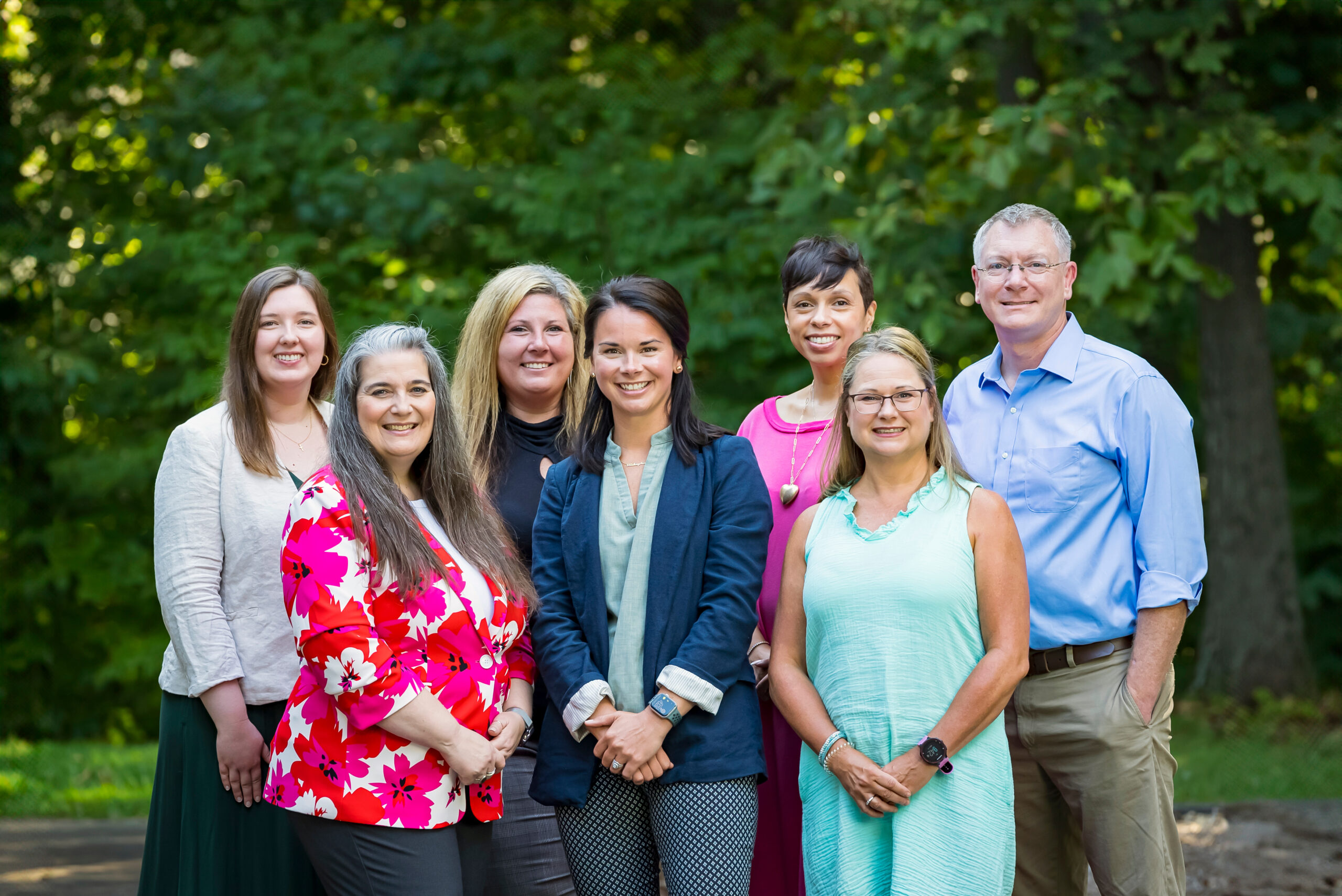 Group photo of the IPiE team. Front left to right: Dr. Jennifer Lingle, Dr. Megan Martin, Carrie Burch. Back left to right: Emilie Vandiver, Elise Robertson, Dr. Faith Freeman, Dr. Holt Wilson.