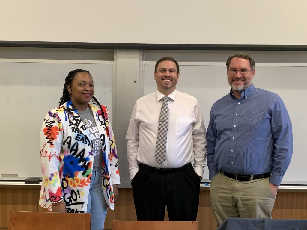 Three K-12 school district research leaders who spoke on the event's panel pose for picture.