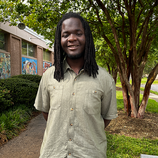 IPiE Undergraduate Student tutor works with students at the Black Child Development Institute Greensboro.